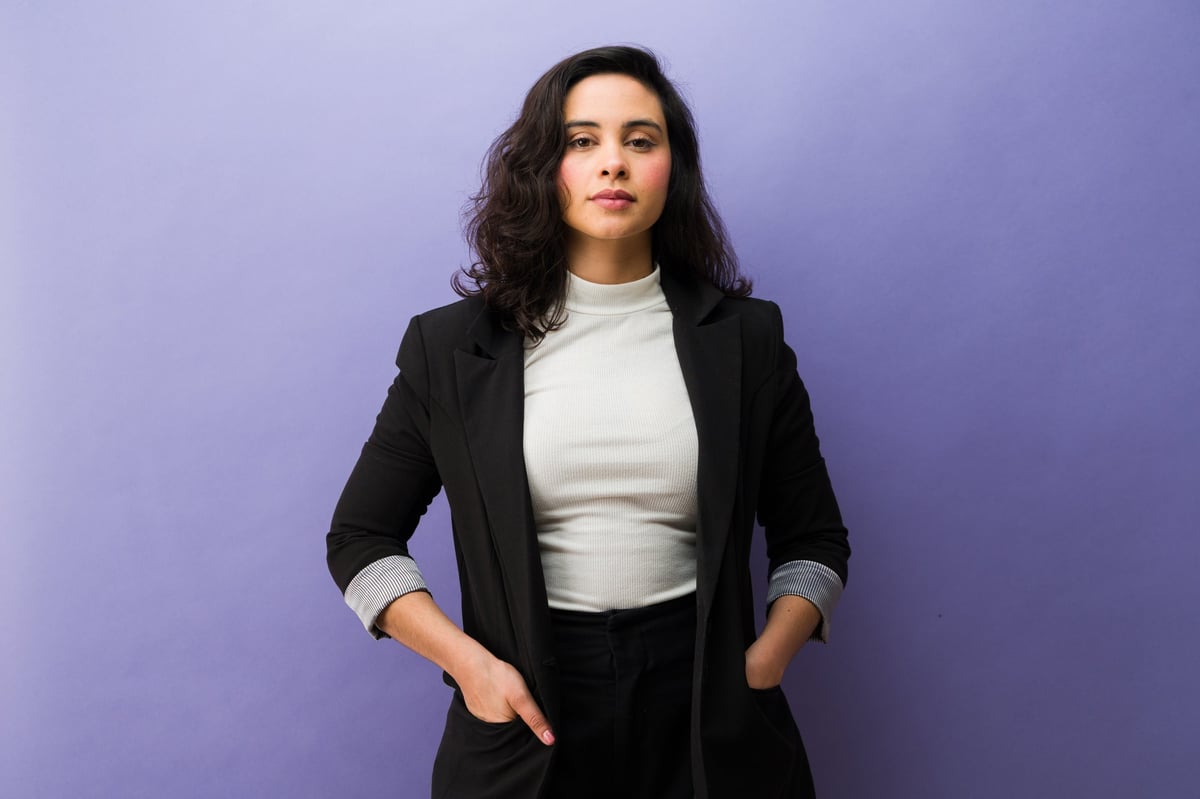 Confident professional businesswoman in a tailored black blazer